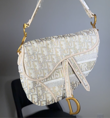 gold dior saddle bag